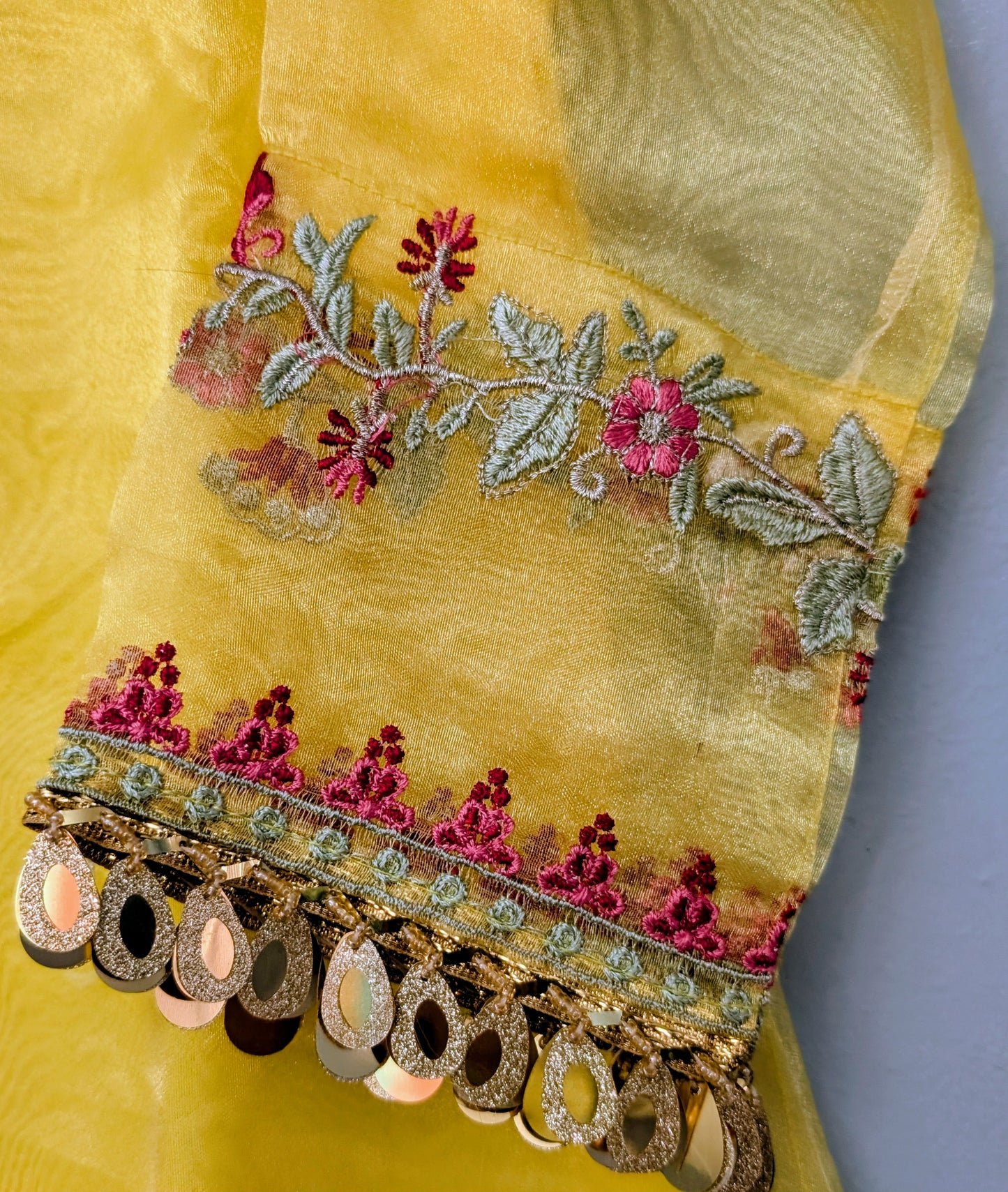 Girls yellow organza fully embroidered maxi with yellow silk trouser and gold dupatta