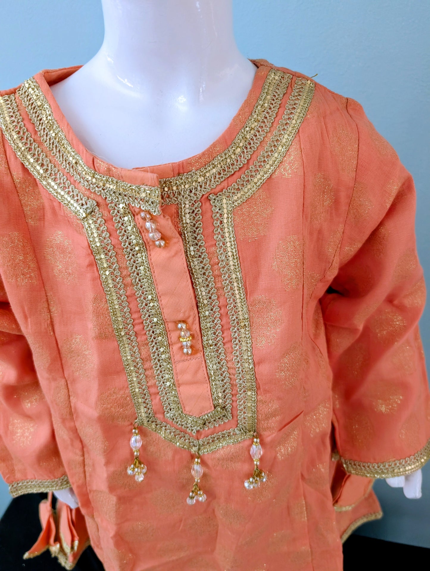 Girls peach and golden air line shirt with matching trouser