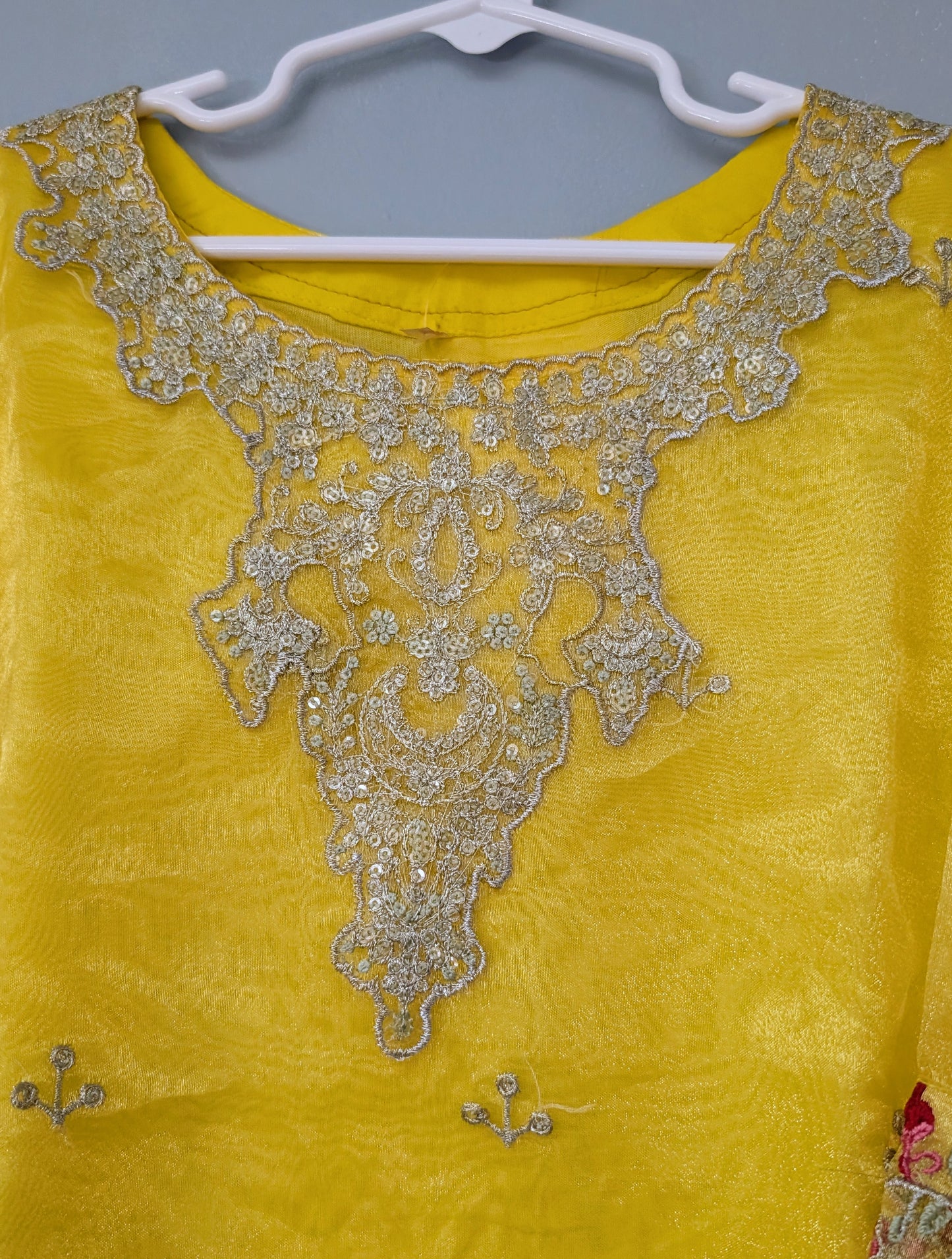 Girls yellow organza fully embroidered maxi with yellow silk trouser and gold dupatta