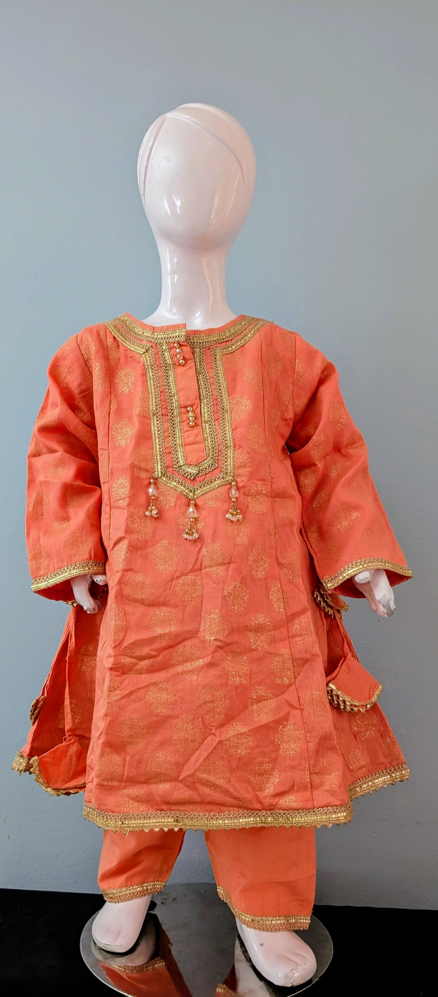 Girls peach and golden air line shirt with matching trouser