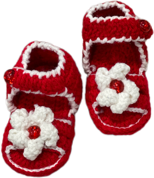 Beautiful hand knit booties for baby girl