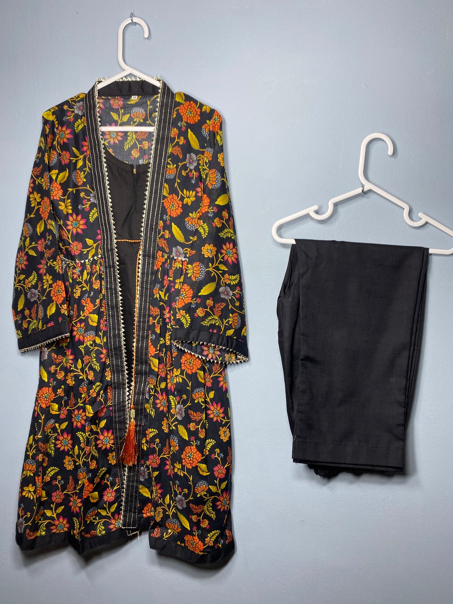 Beautiful lawn multi floral print front open style frock with mix and match black cotton trouser