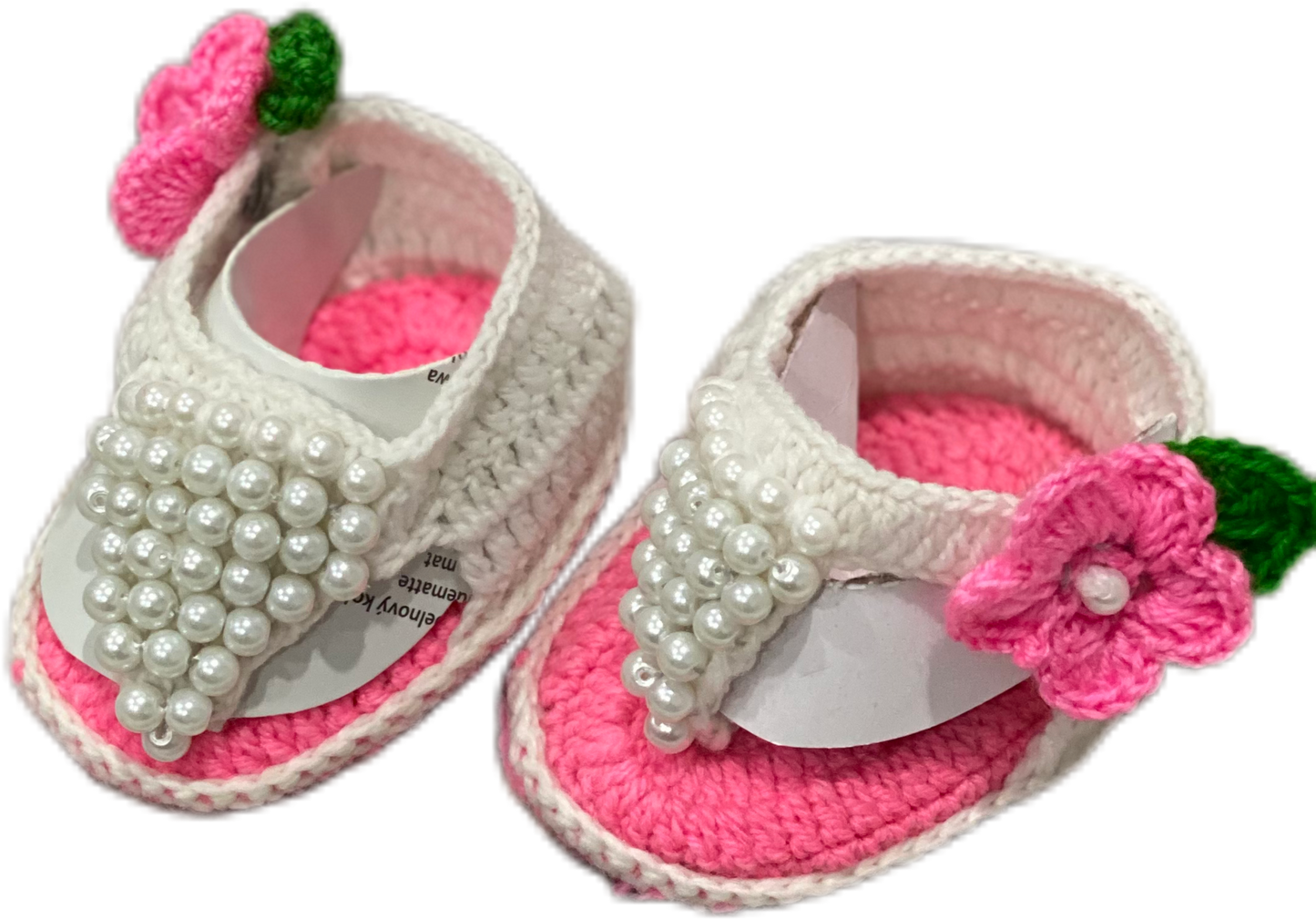 White and pink hand knit footwear with matching headband for baby girl