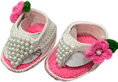 White and pink hand knit footwear with matching headband for baby girl