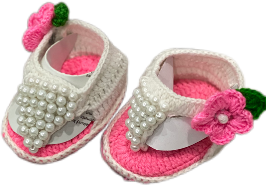White and pink hand knit footwear with matching headband for baby girl