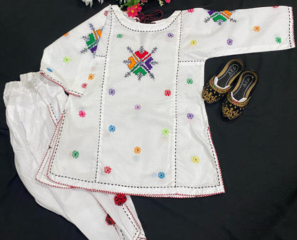 Beautiful white kurta pyjama with traditional Pakistani hand embroidery(Baluchi Kerhai)c