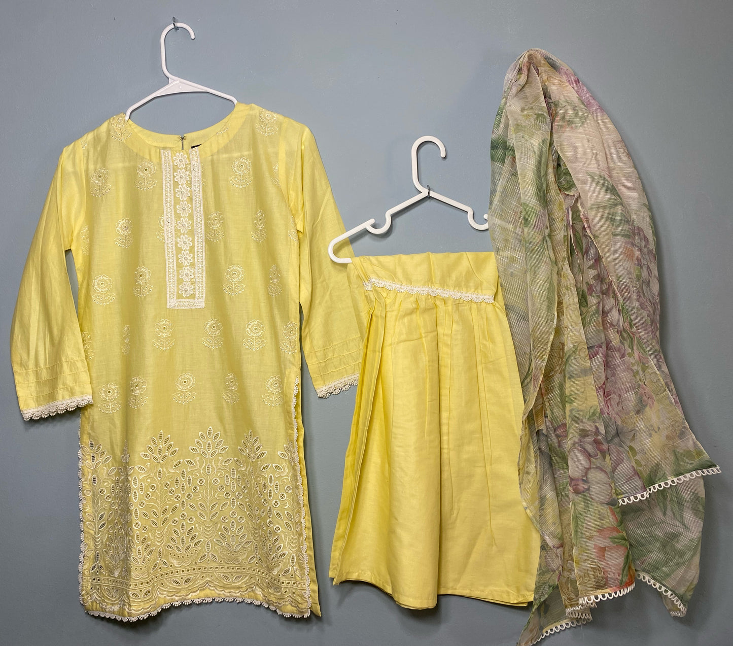 Beautiful light yellow lawn chicken Kari kurta with matching gharara and beautiful printed dupatta(lawn)