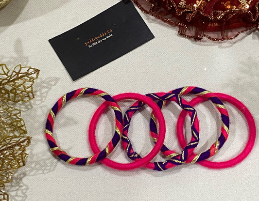 Girls hot pink and purple bangles