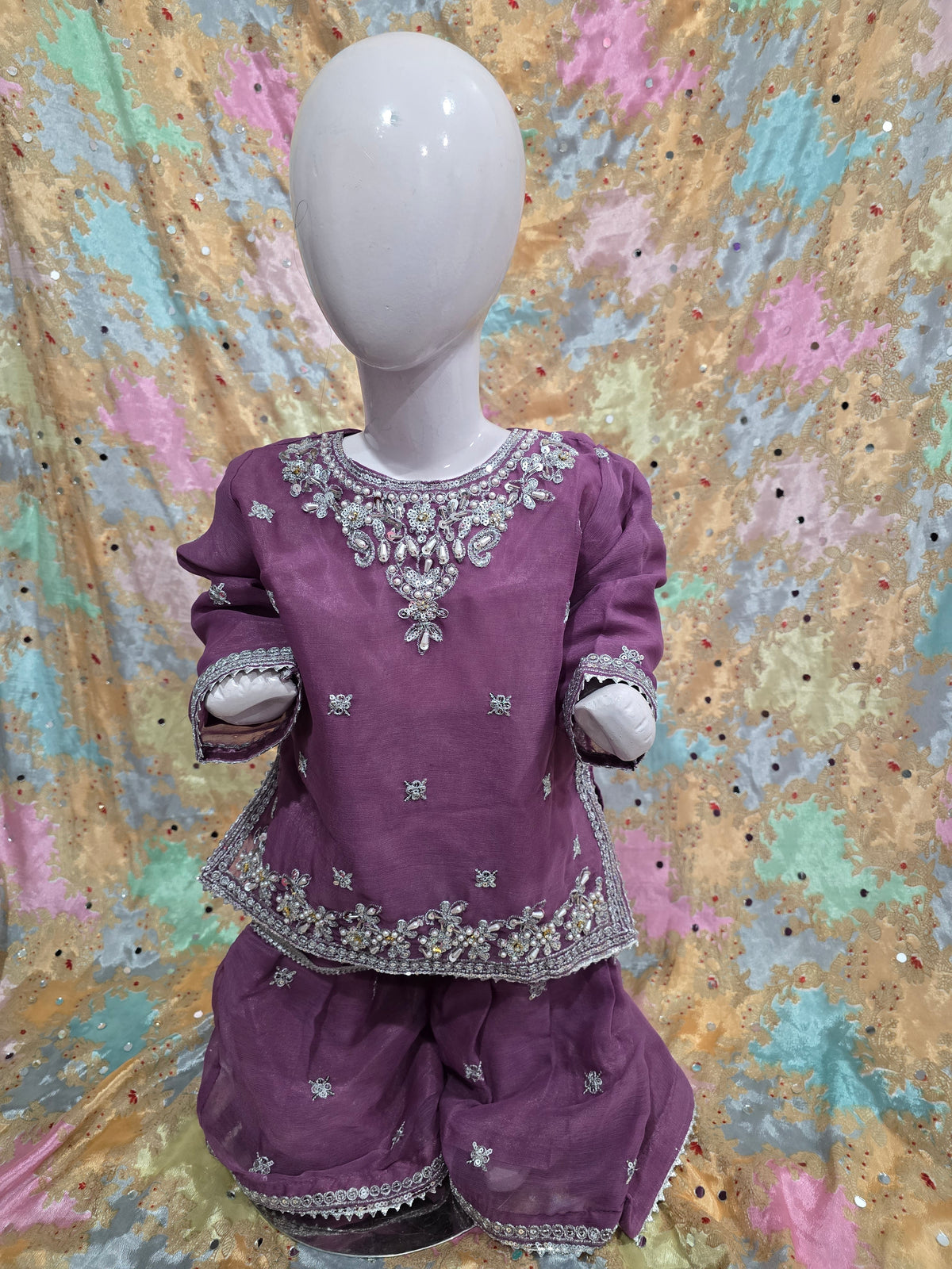 Girls Mauve Embroidered 3-Piece Set: Organza kurta with a pearl-beaded yoke, matching embroidered gharara  and a lightweight dupatta.