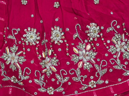 Girls magenta front-open chiffon frock featuring intricate hand embroidery, paired with a matching gharara accented by gotta lace trim and a coordinating chiffon dupatta.