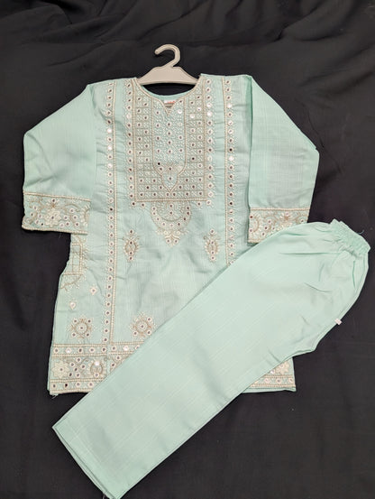 Girls' cotton dress with full mirror work embroidery and matching pants.