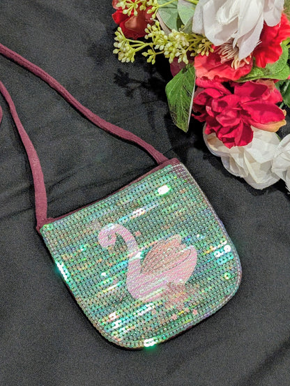 Shimmery bags with swan motifs for girls