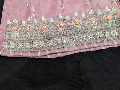 Girls' mauve kurta crafted from soft silk with an inner lining, featuring intricate hand-embellishments. It is paired with a matching gharara made from smooth, premium malai fabric and an ethereal moonlight dupatta.