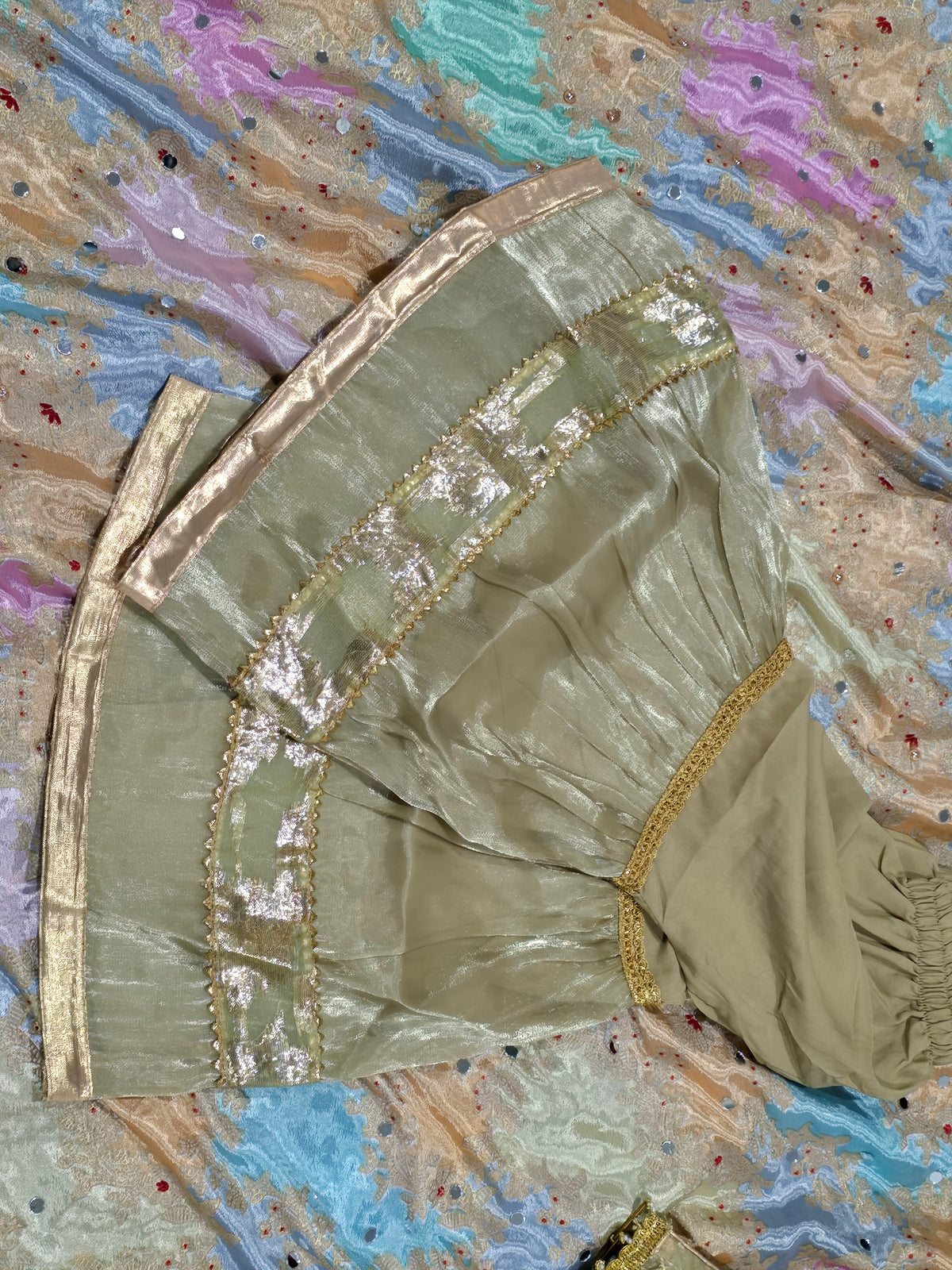 Girls /Olive-gold/  hand-embroidered /silk/ short kurta paired with matching flared gharara and sheer dupatta.