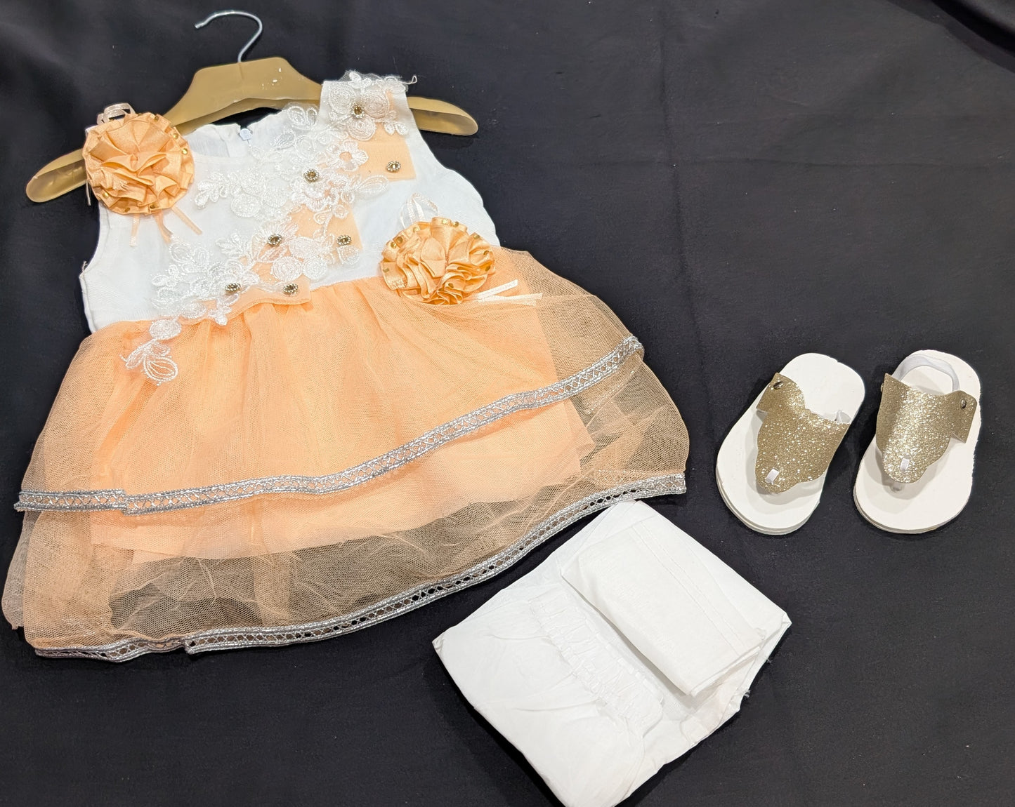 Baby girl's fancy frock, pants, and shoes