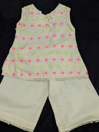 Infant lawn sleeveless tunic and matching wide-leg trousers with pink and lime green diamond patterns